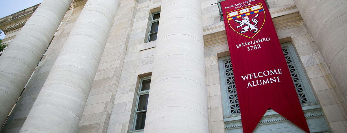 Photo of Welcome Alumni banner hanging on Gordon Hall.