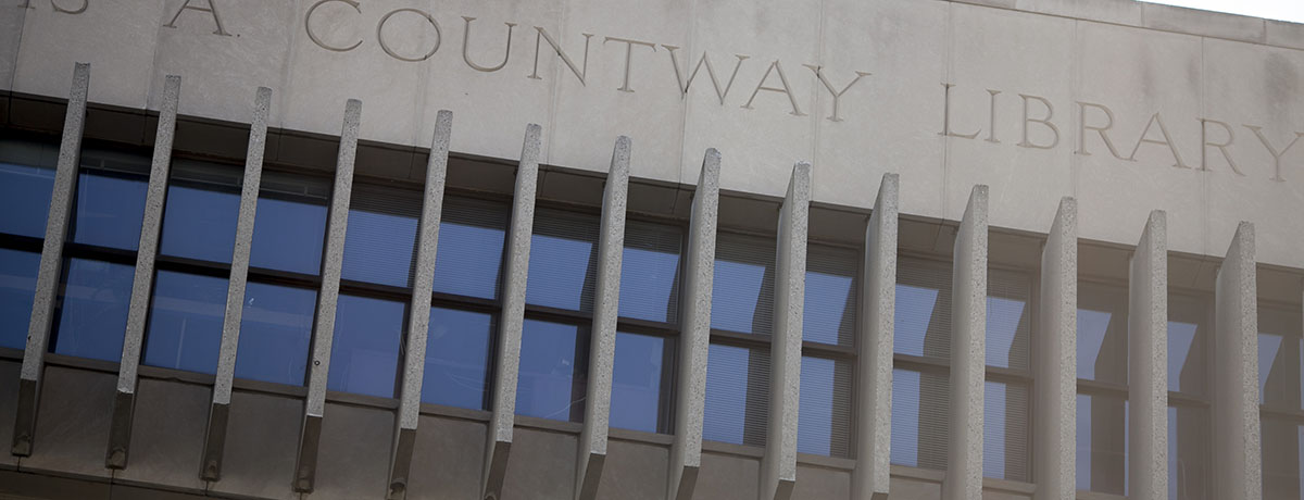 Photo of the engraved letters outside the entry of the Countway Library.